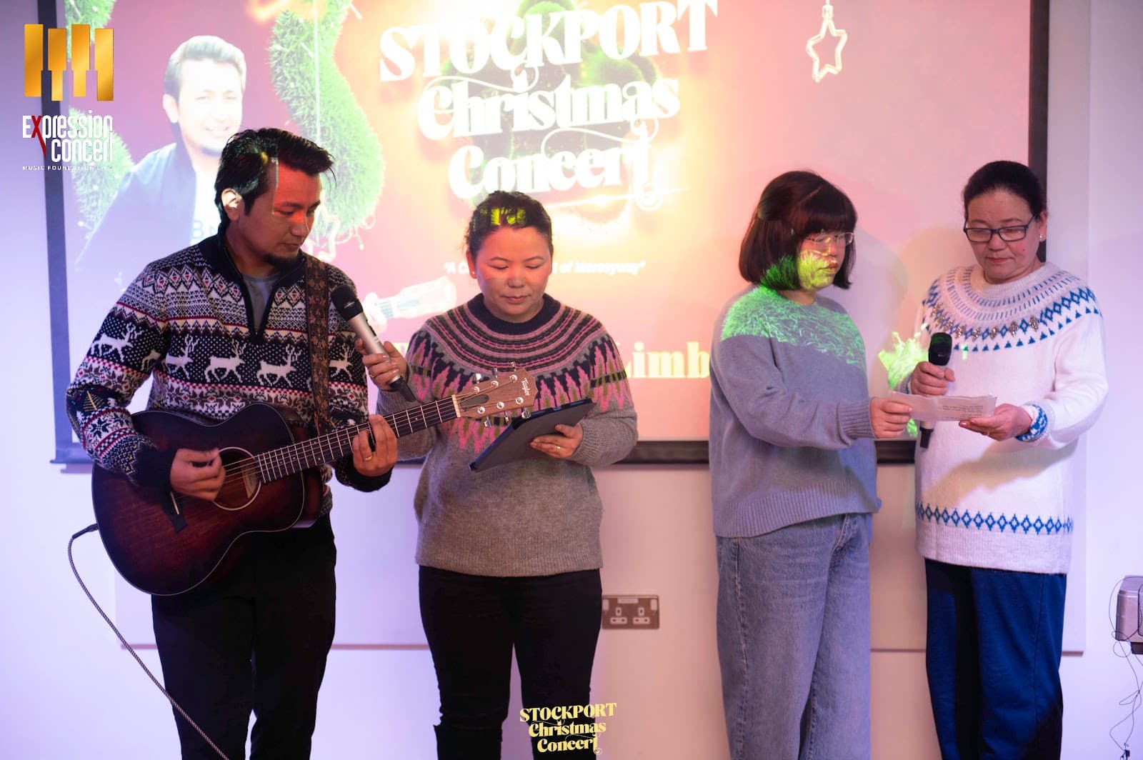 A singer performing at the Christmas Concert