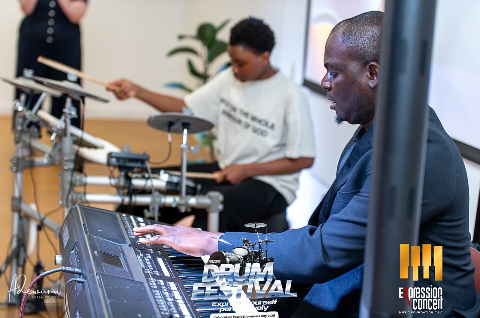 A student and tutor at the keyboard